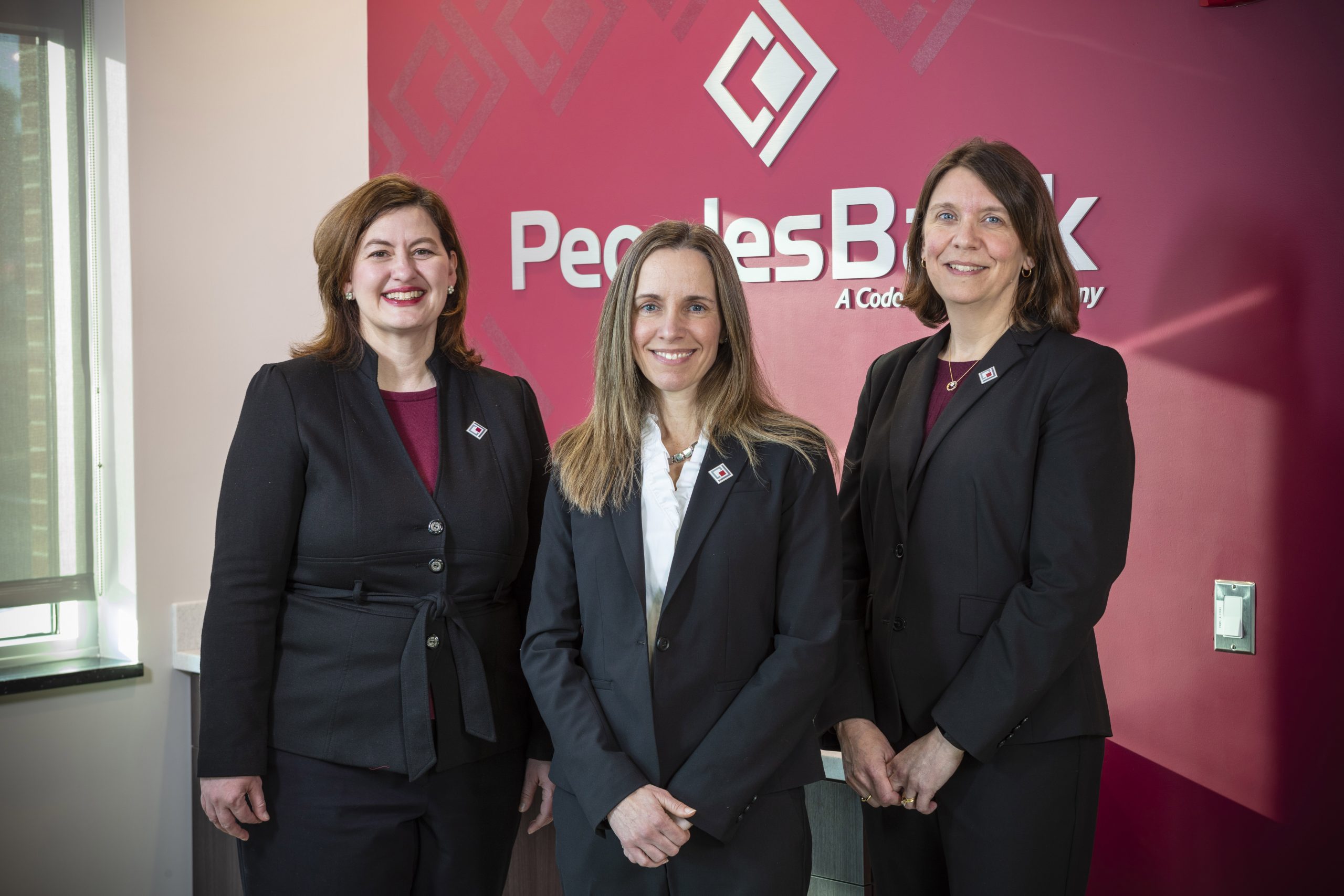 group photo of female executives